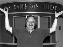 Max, at the Max: Max Cameron stands before the theatre named after his grandfather, who also bore his name.